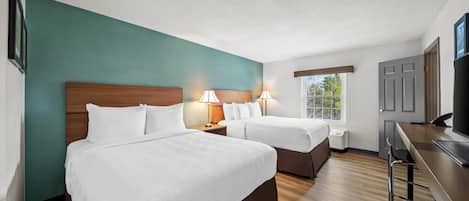 Suite, 2 lits doubles, non-fumeur | Rideaux dâobscurcissement, fer et planche Ă repasser