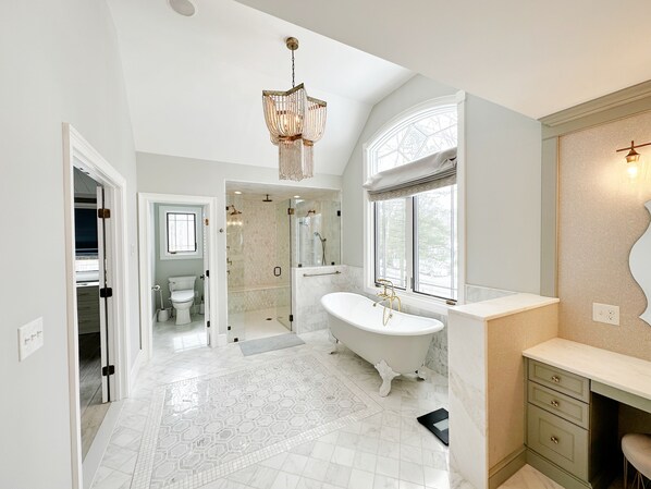 Shower, hair dryer, towels, soap