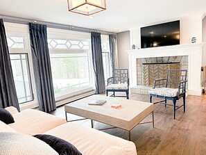 Smart TV, fireplace, foosball, computer monitors