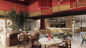 Um interior moderno com área de bar, assentos e uma planta grande.