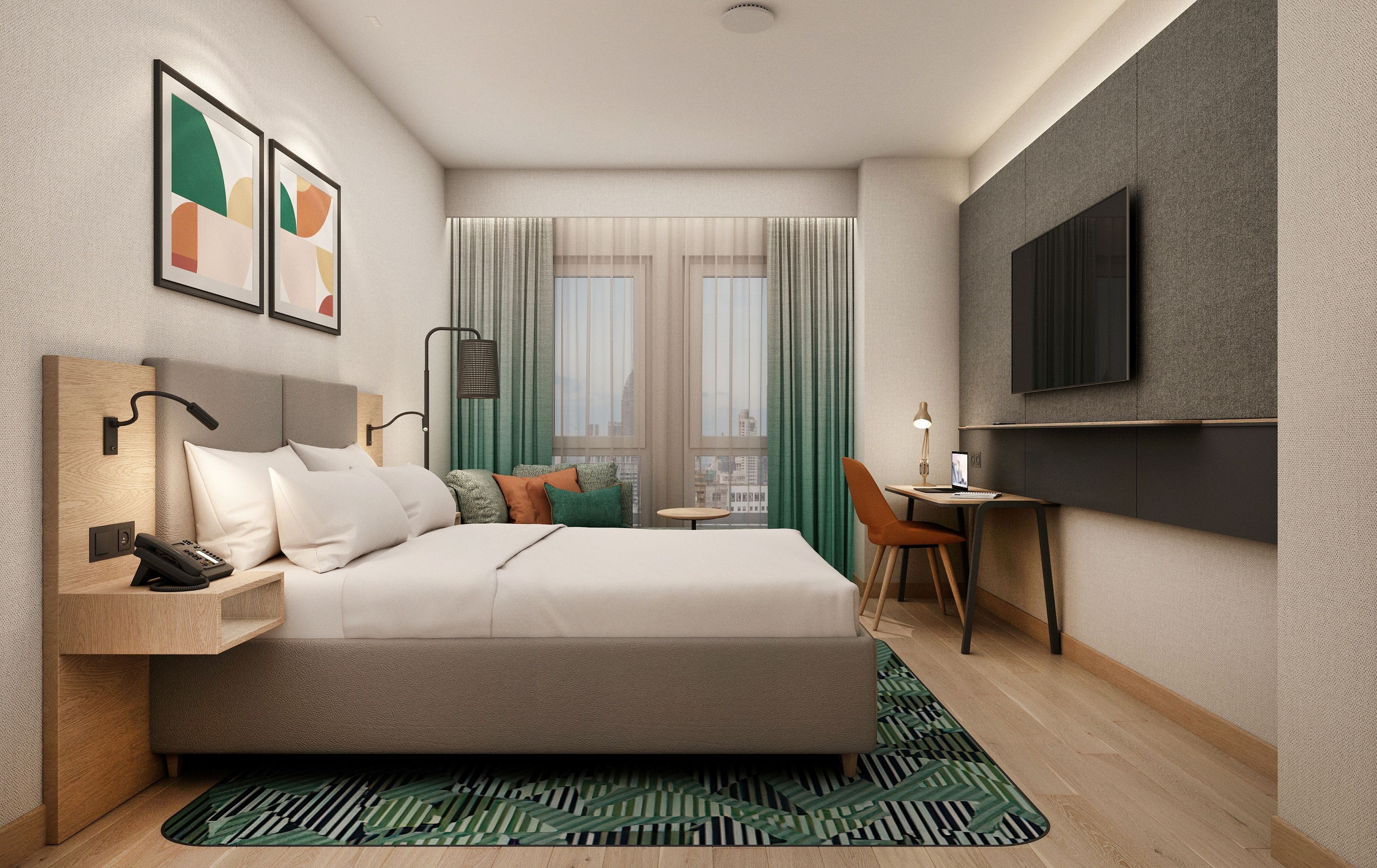 Une chambre d’hôtel moderne, équipée d’un lit, d’une table de chevet, d’une lampe, d’une télévision et offrant une vue sur la ville par la fenêtre.
