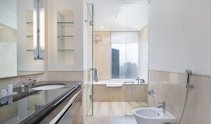 Bathtub, hair dryer, towels