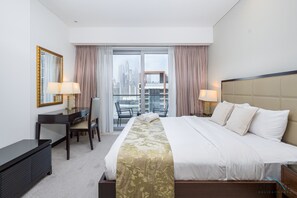 1 chambre, coffres-forts dans les chambres, fer et planche à repasser