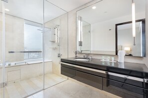 Bathtub, hair dryer, towels