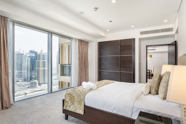 2 chambres, coffres-forts dans les chambres, fer et planche Ă repasser