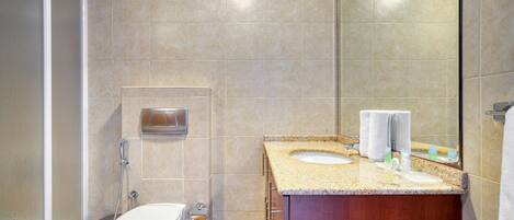 Bathtub, hair dryer, towels, soap