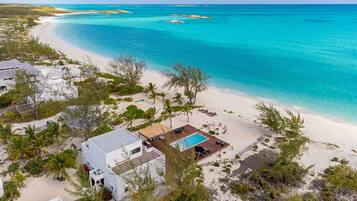 On the beach, sun loungers, beach towels