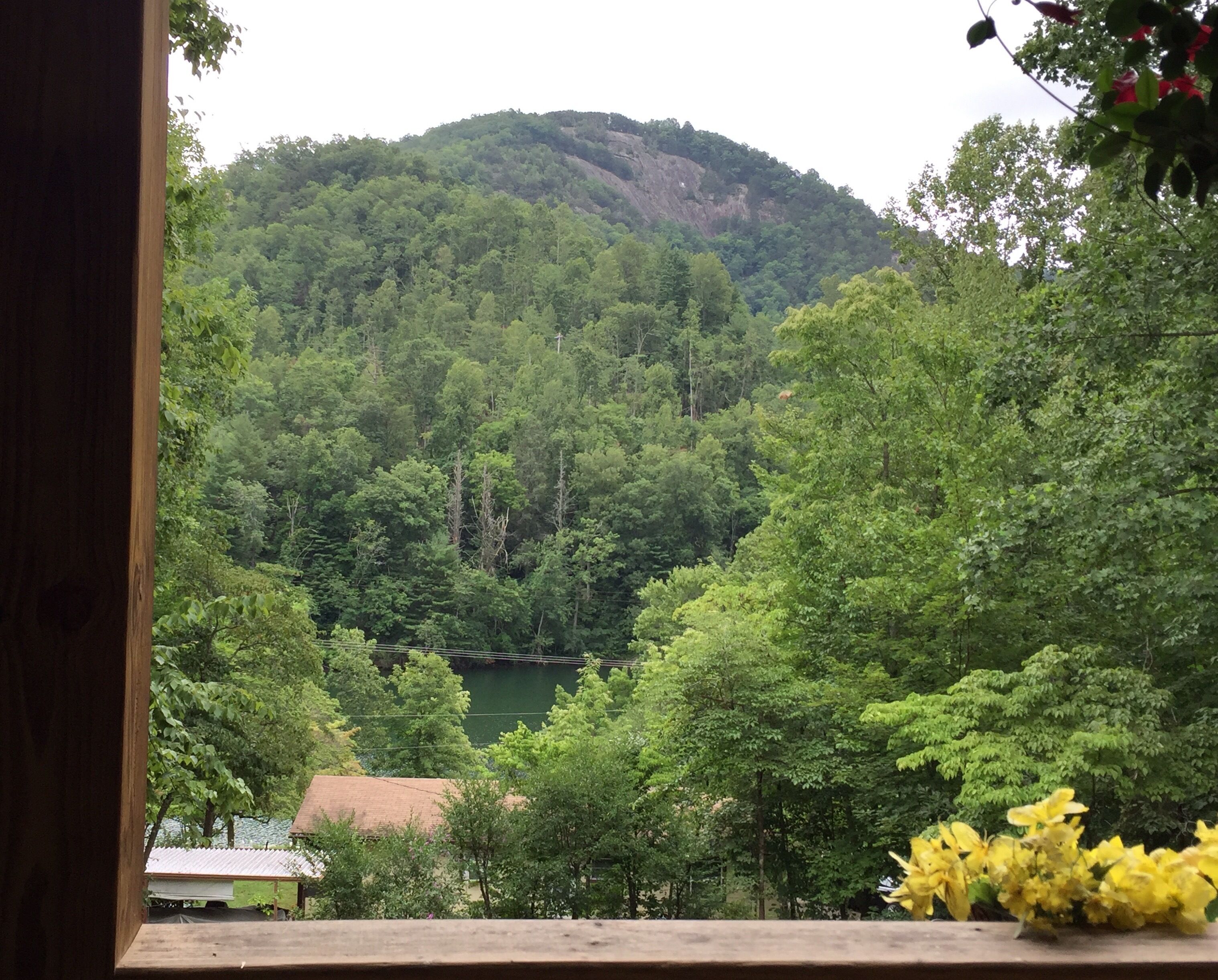 Home with huge front porch and lake views