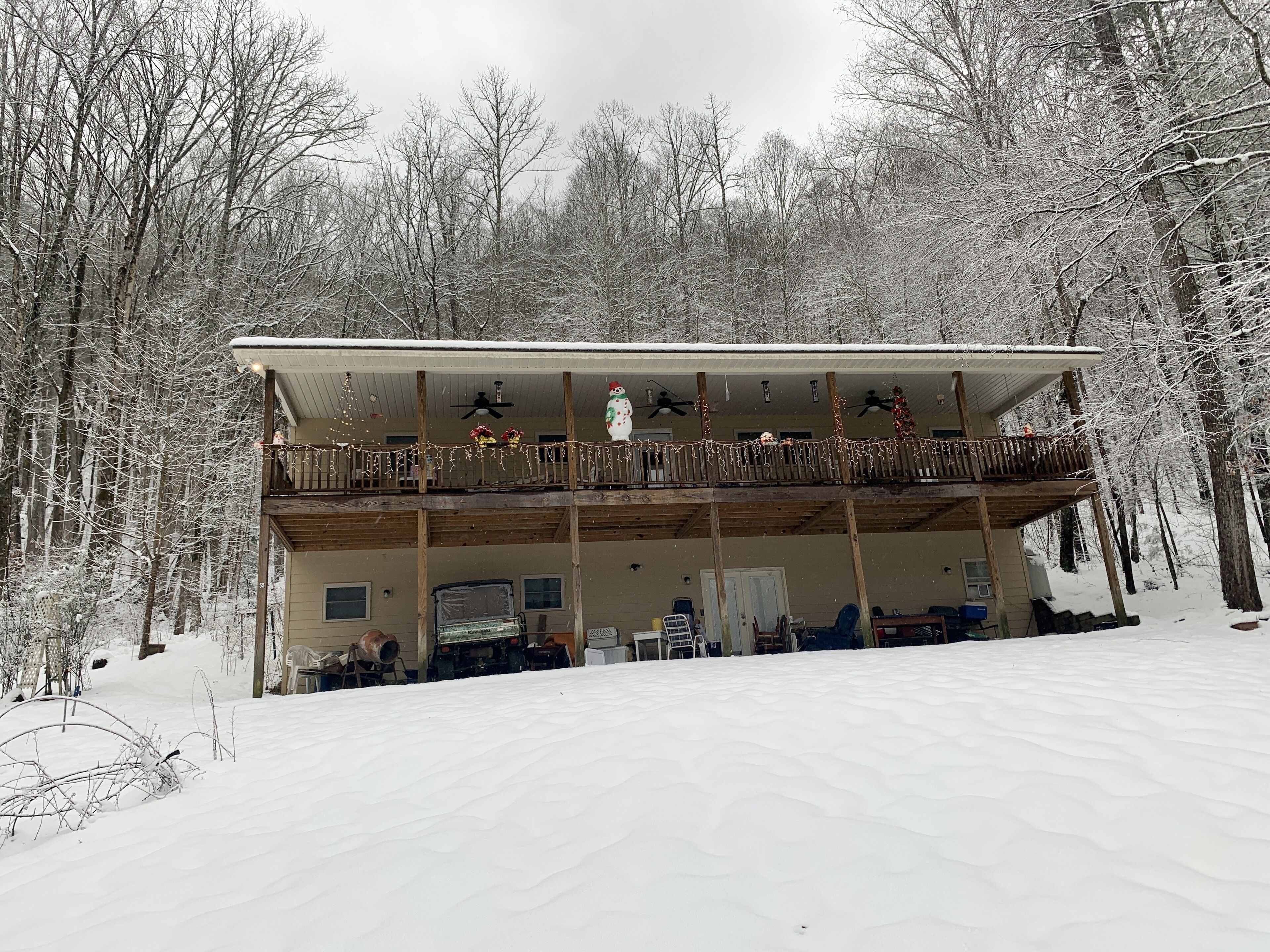 Home with huge front porch and lake views