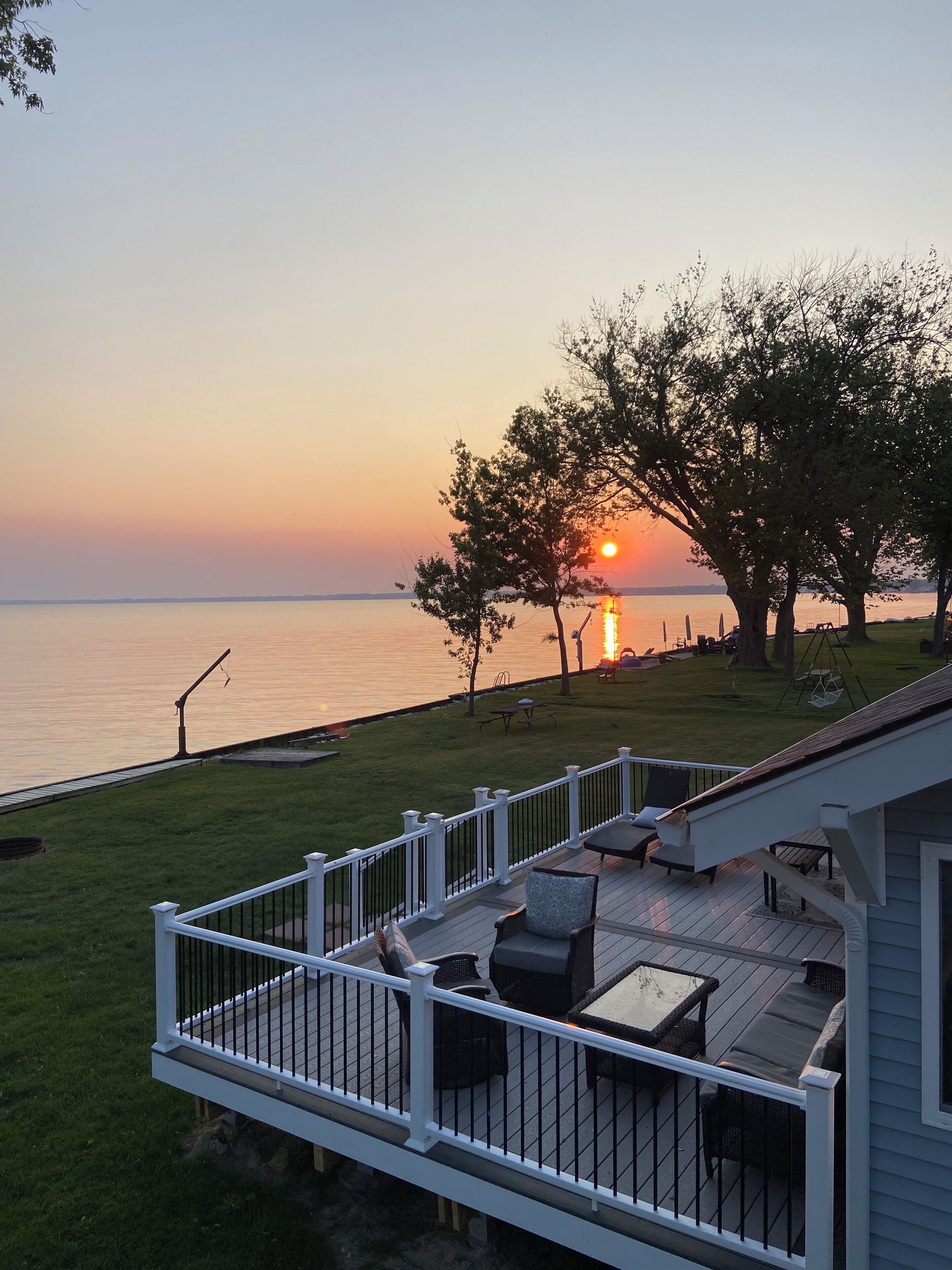 Enjoy Beautiful Sunsets at this Lake House w a HOT TUB, Boat Garage and Game Rm 