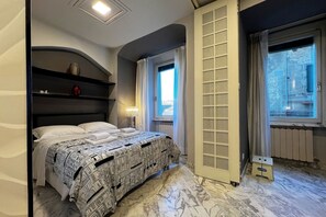1 habitación, tabla de planchar con plancha, wifi y ropa de cama 