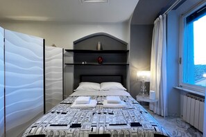 1 habitación, tabla de planchar con plancha, wifi y ropa de cama 