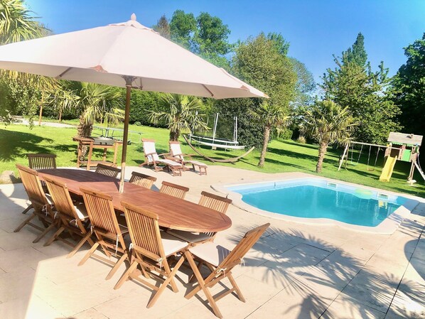 Alberca al aire libre y alberca climatizada