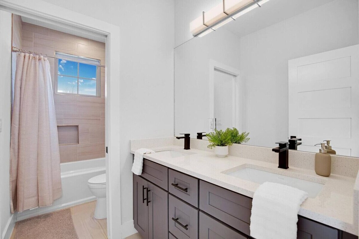 Photo 32 of Downtown Bliss: Modern 4-Bedroom Retreat w/Hot Tub