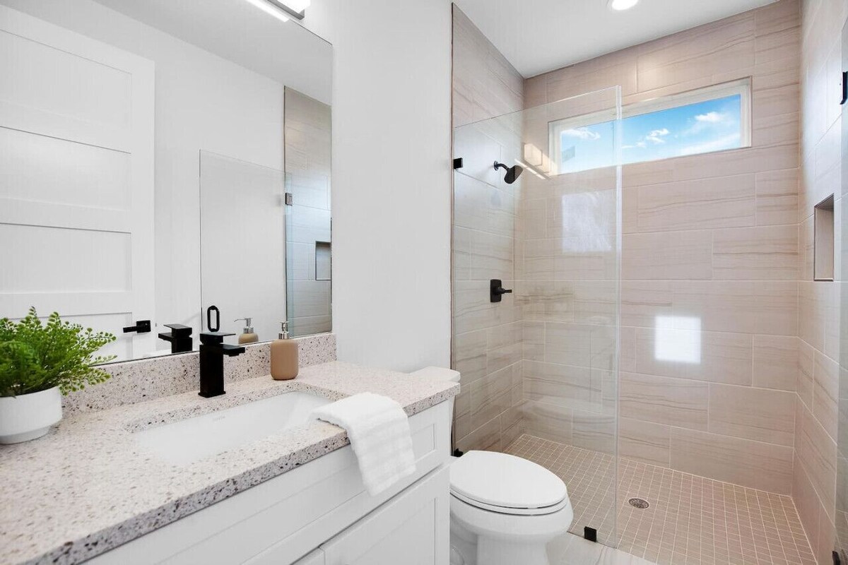 Photo 5 of Downtown Bliss: Modern 4-Bedroom Retreat w/Hot Tub