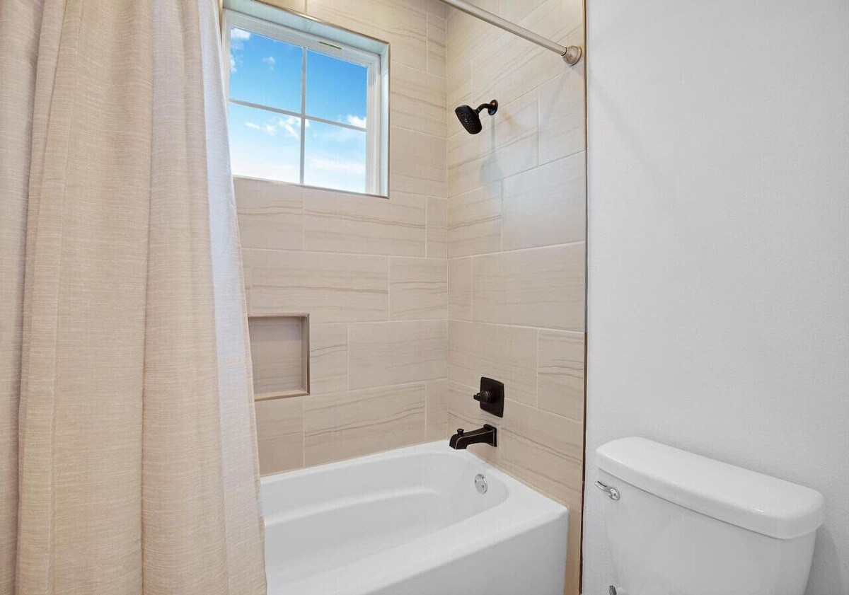 Photo 28 of Downtown Bliss: Modern 4-Bedroom Retreat w/Hot Tub