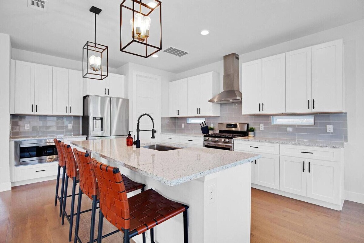 Photo 3 of Downtown Bliss: Modern 4-Bedroom Retreat w/Hot Tub