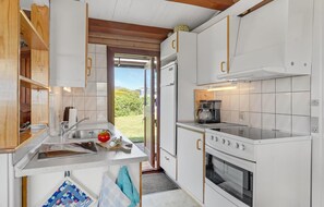 Fridge, stovetop, coffee/tea maker