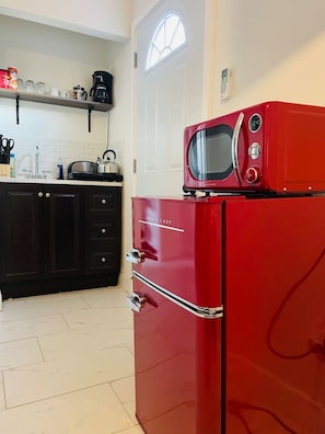 Fridge, microwave, coffee/tea maker, toaster