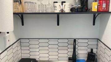 Fridge, microwave, coffee/tea maker, toaster