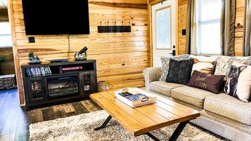 Smart TV, fireplace, DVD player, books