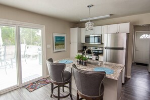Fridge, microwave, dishwasher, coffee/tea maker