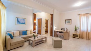 Apartment, 2 Bedrooms, Ocean View | Living room | Books - Katerina Residence - Beachfront Plaz Eot (Zakynthos)