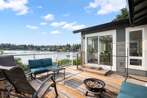 Terrace/patio - Pet-Friendly Coastal Lake House – Minutes to the Ocean, Cozy Fireplace, Sunroom & King Beds (Otis)