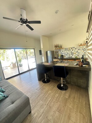 Fridge, microwave, stovetop, coffee/tea maker