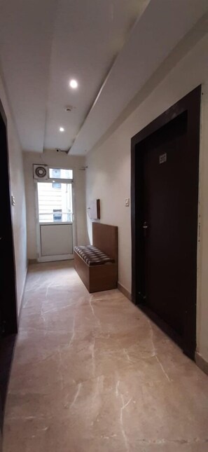 Habitación doble ejecutiva | Baño | Pantuflas
