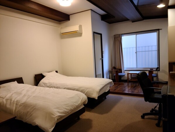 1 chambre, bureau, accès au Wi-Fi (inclus), literie fournie