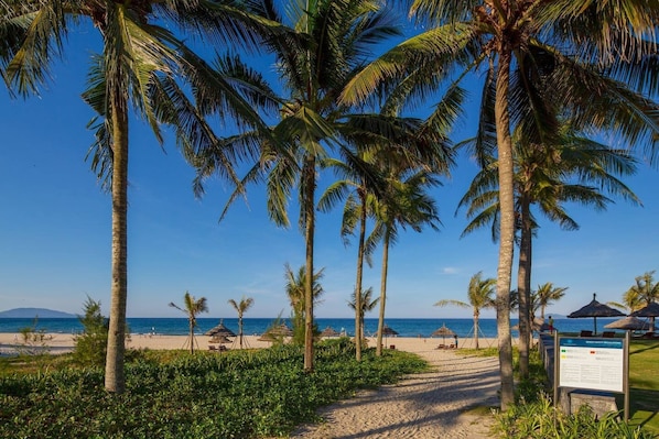 Guests can enjoy access to the ocean from this serene beach.
