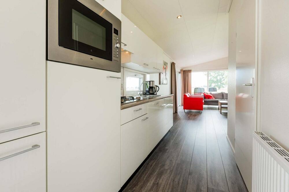 ✓ Parel at Recreatiepark het Esmeer ✓ Holiday home for 4 persons ✓ Located in Aalst (Gelderland) ✓ Waterside holiday park ✓ Book directly through the park