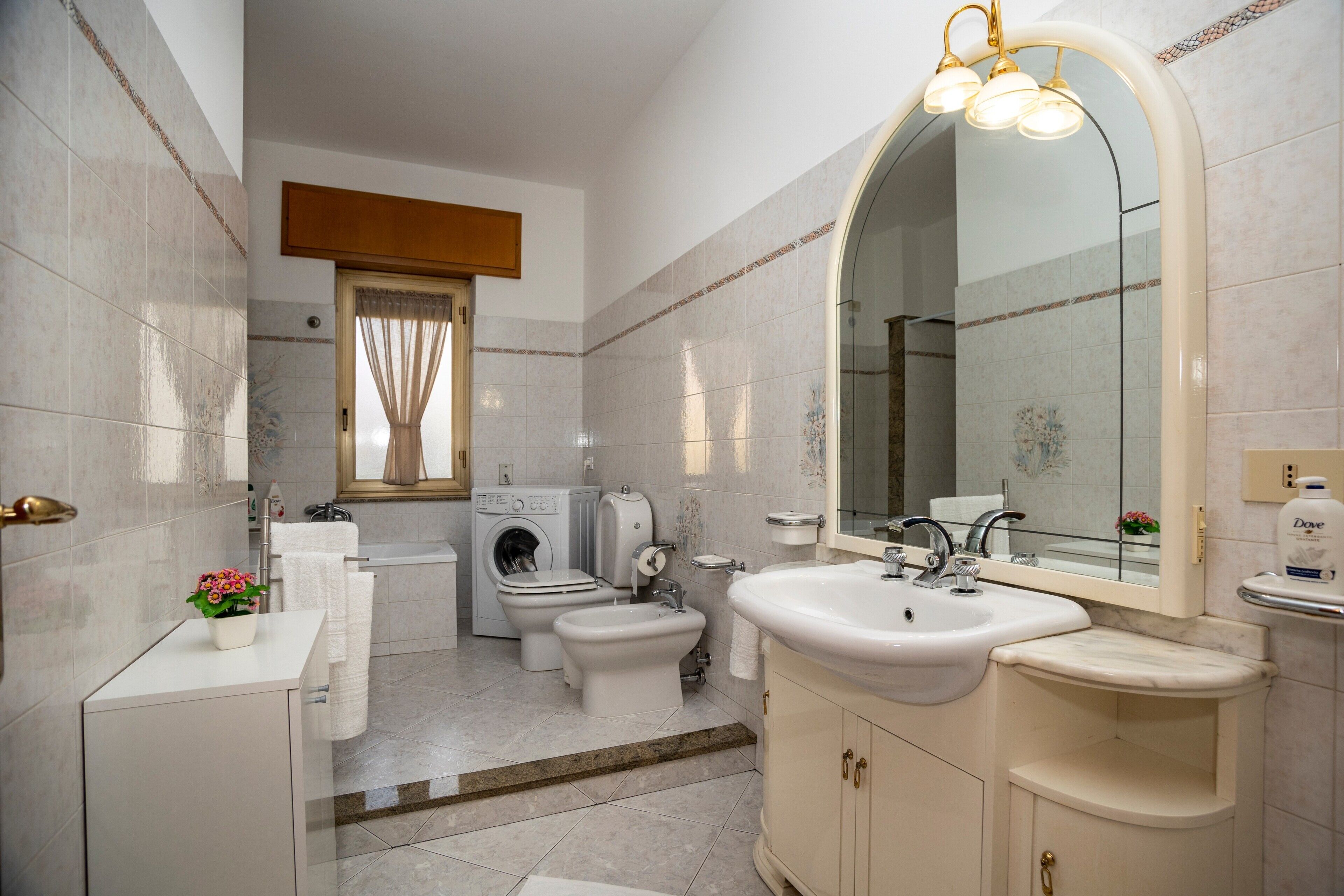 Bathtub, hair dryer, towels