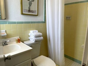 Hair dryer, towels, toilet paper