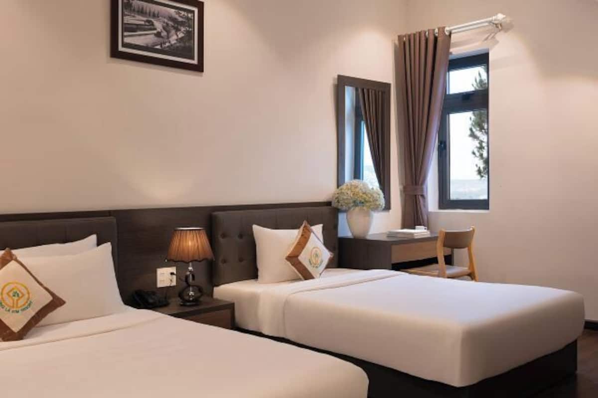 Mini-bar avec articles gratuits, bureau, rideaux occultants