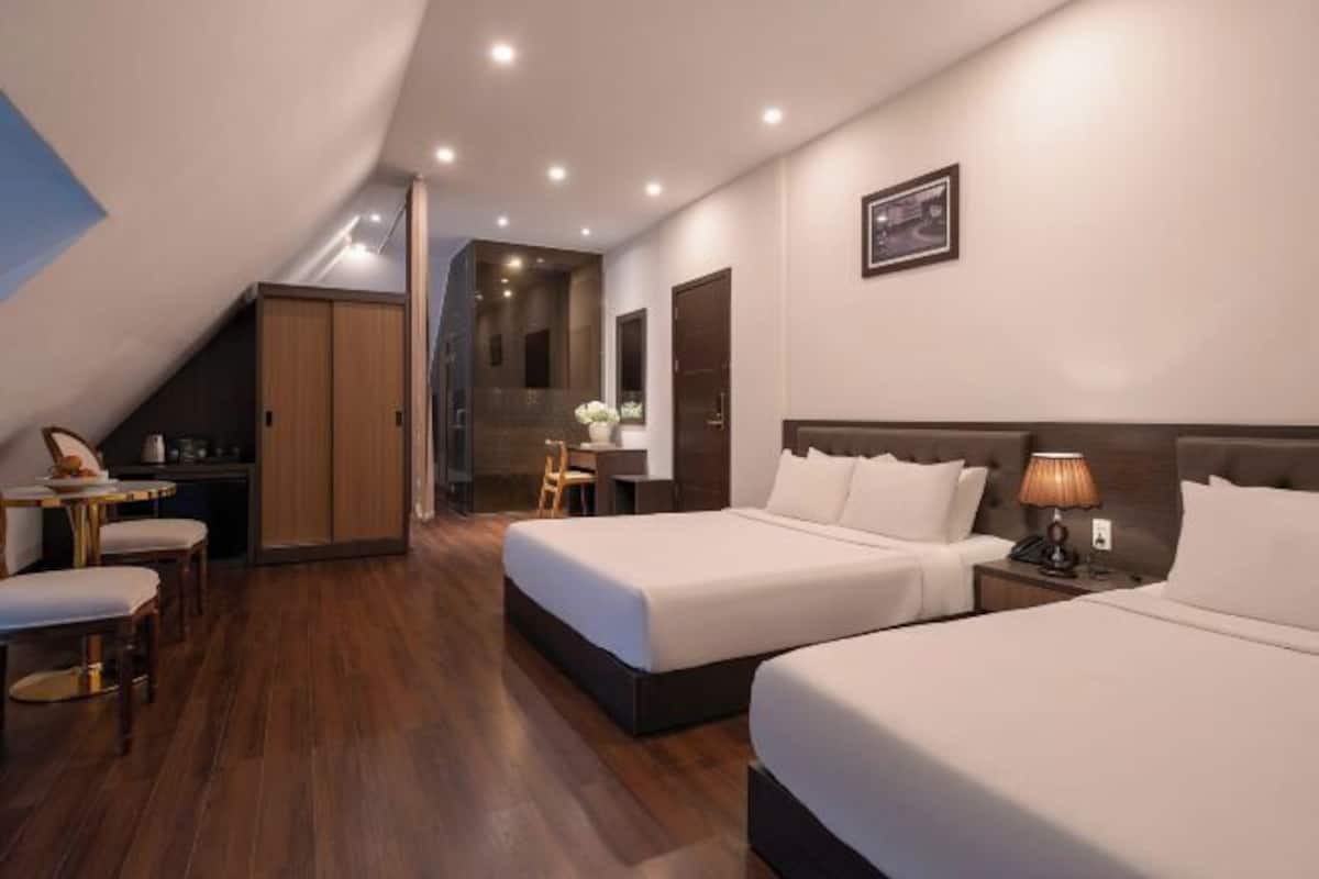 Mini-bar avec articles gratuits, bureau, rideaux occultants