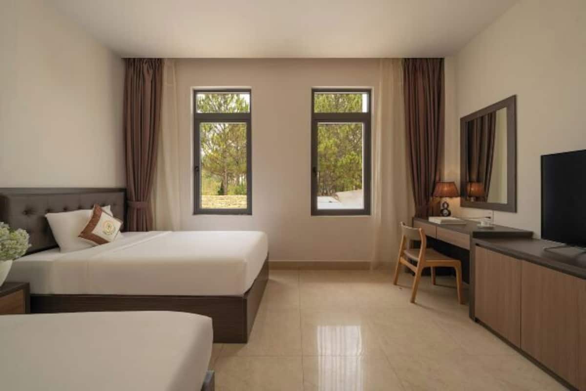 Mini-bar avec articles gratuits, bureau, rideaux occultants