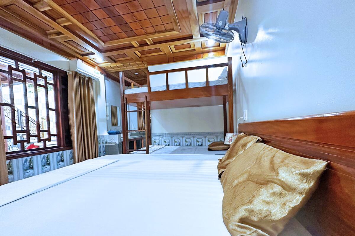 Deluxe Quadruple Room | 1 bedroom, hypo-allergenic bedding, down comforters, memory foam beds