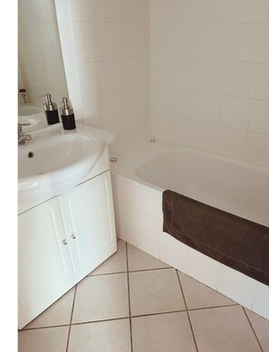 Hair dryer, towels, soap, toilet paper