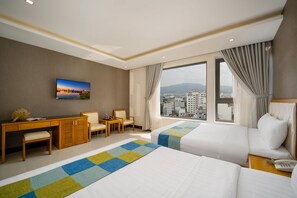 Habitación cuádruple de lujo | Ropa de cama hipoalergénica, colchones Select Comfort, minibar