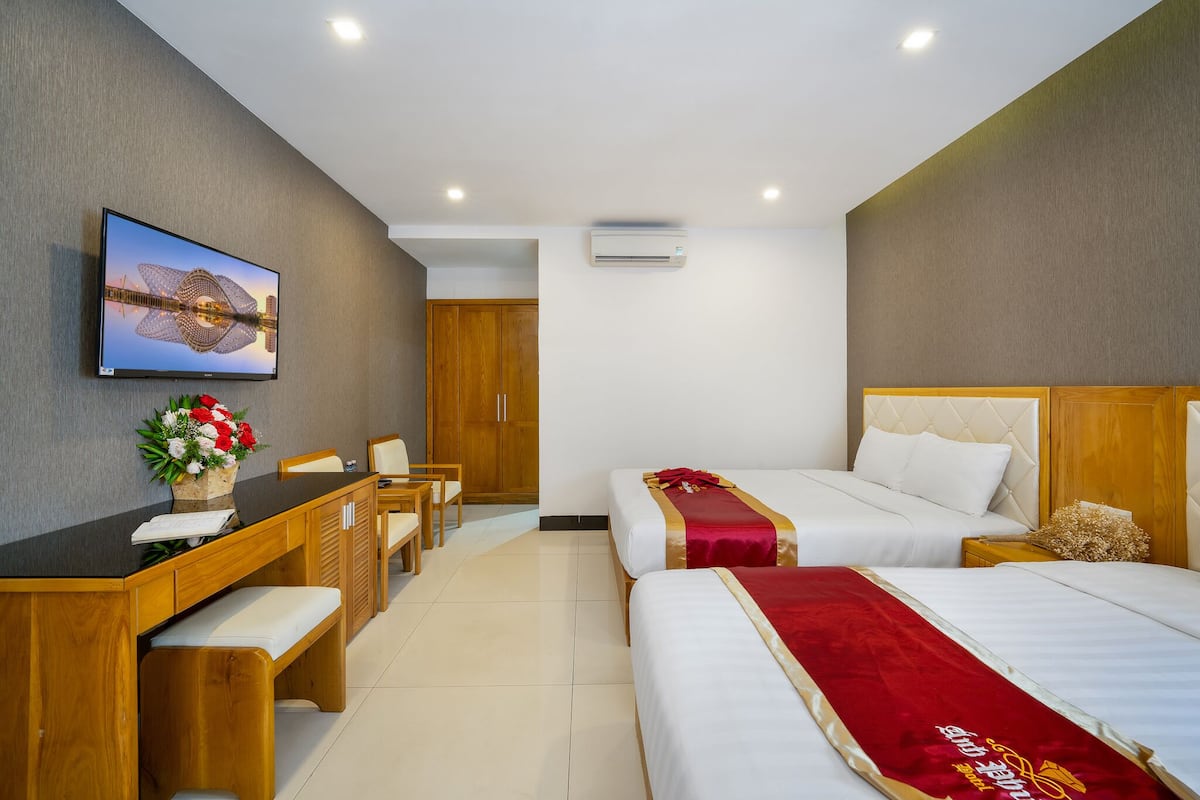 Habitación cuádruple familiar | Ropa de cama hipoalergénica, camas Select Comfort, minibar y escritorio