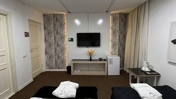 Classic Twin Room | Blackout drapes, iron/ironing board, free WiFi, bed sheets