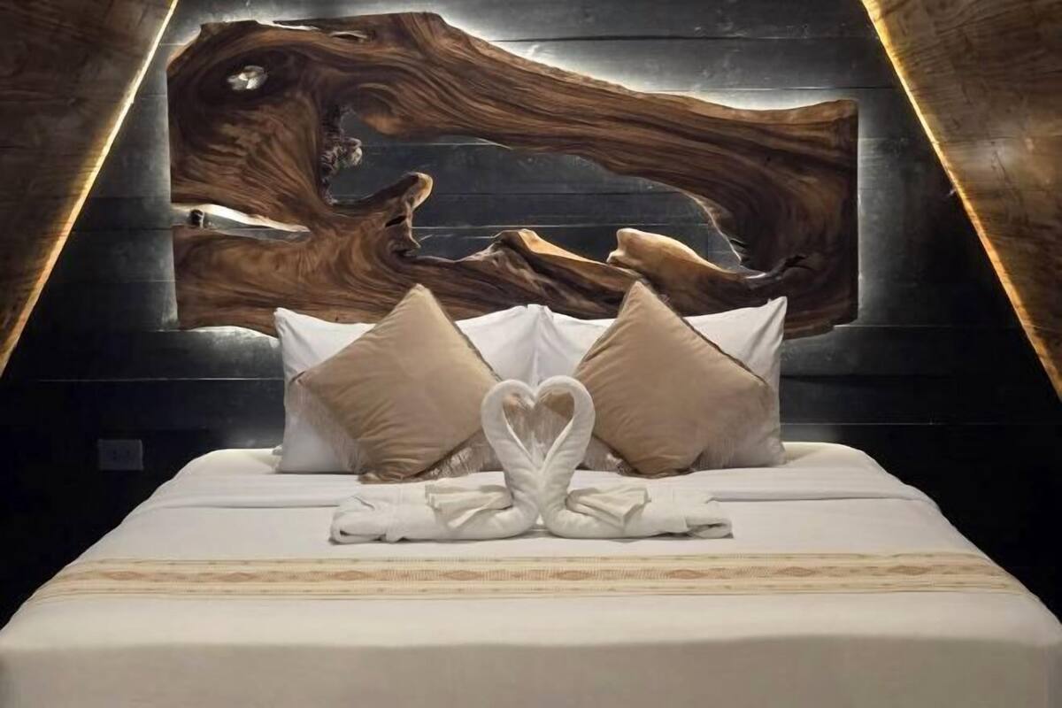 Premium bedding, down comforters, pillowtop beds, minibar