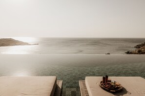 Seasonal outdoor pool, open 9:00 AM to 7:00 PM, pool umbrellas - Enigma Mykonos Boutique Hotel (Mykonos)