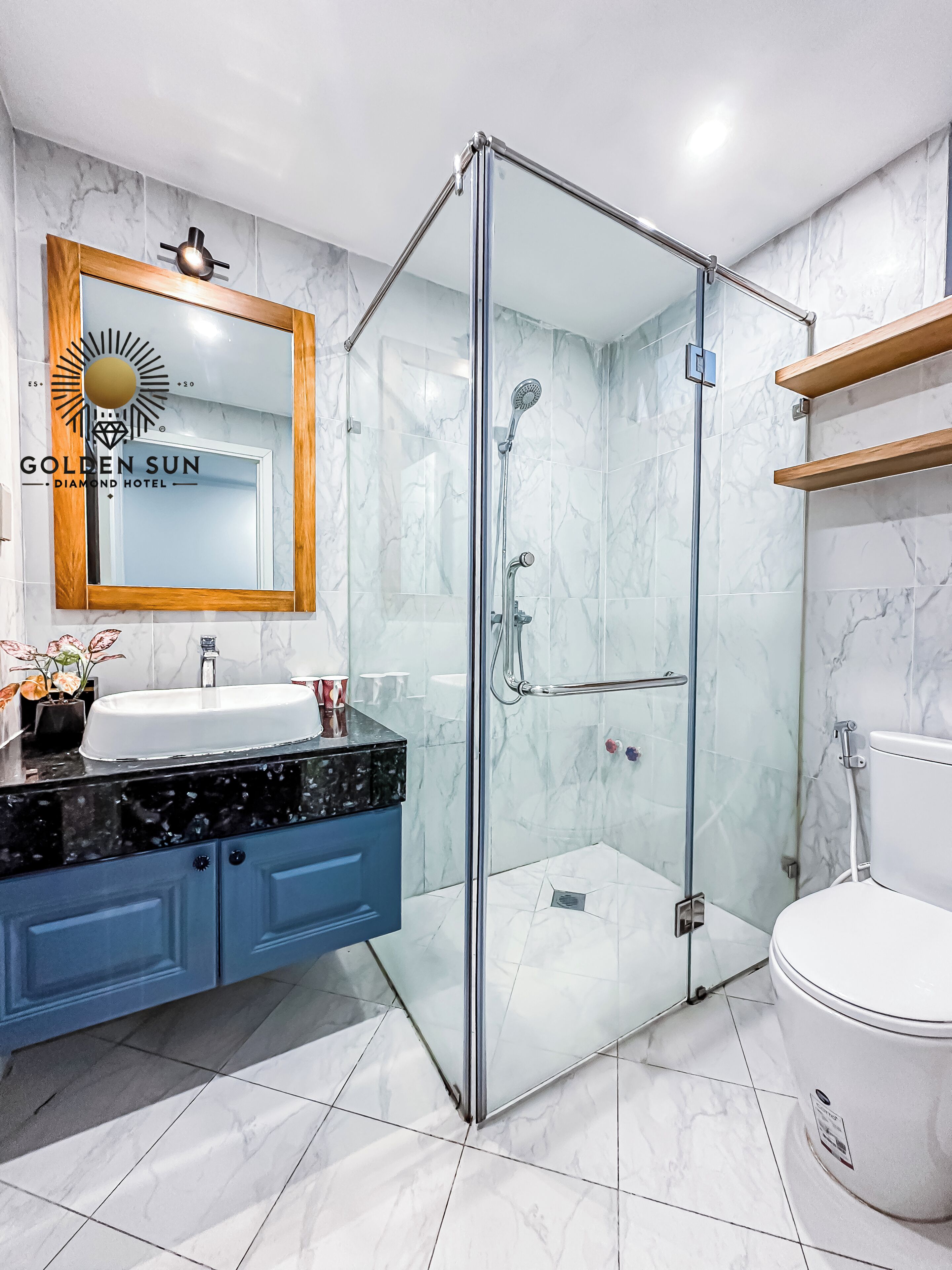 Comfort Room | Bathroom | Shower, designer toiletries, hair dryer, slippers