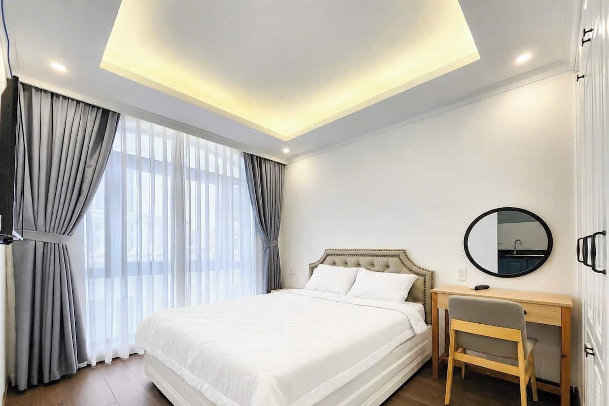 Habitación Deluxe, vista al jardín | Escritorio, wifi gratis y ropa de cama