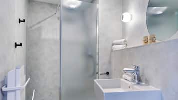 Shower, rainfall showerhead, towels