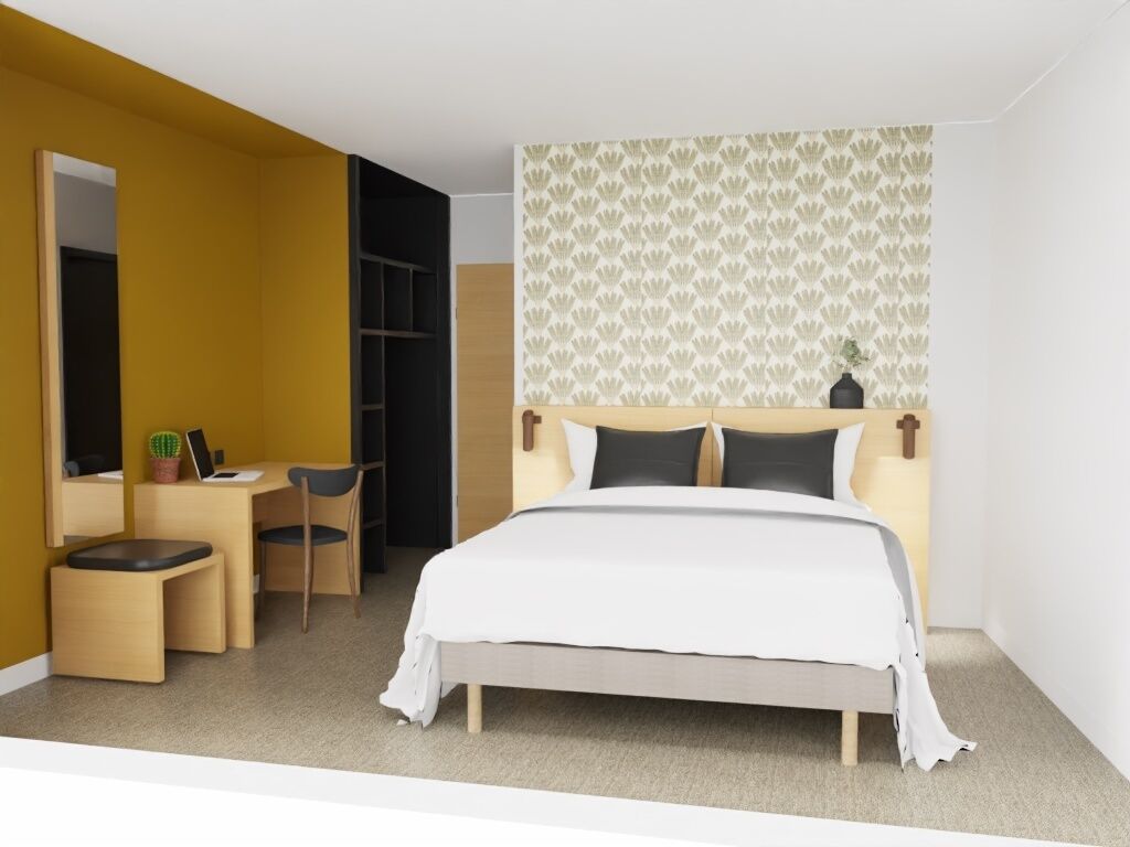 Ein Schlafzimmer mit Bett, Schreibtisch, Stuhl und Kleiderschrank.