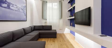 Comfort Apartment | Living area | 40-inch flat-screen TV with digital channels, TV
